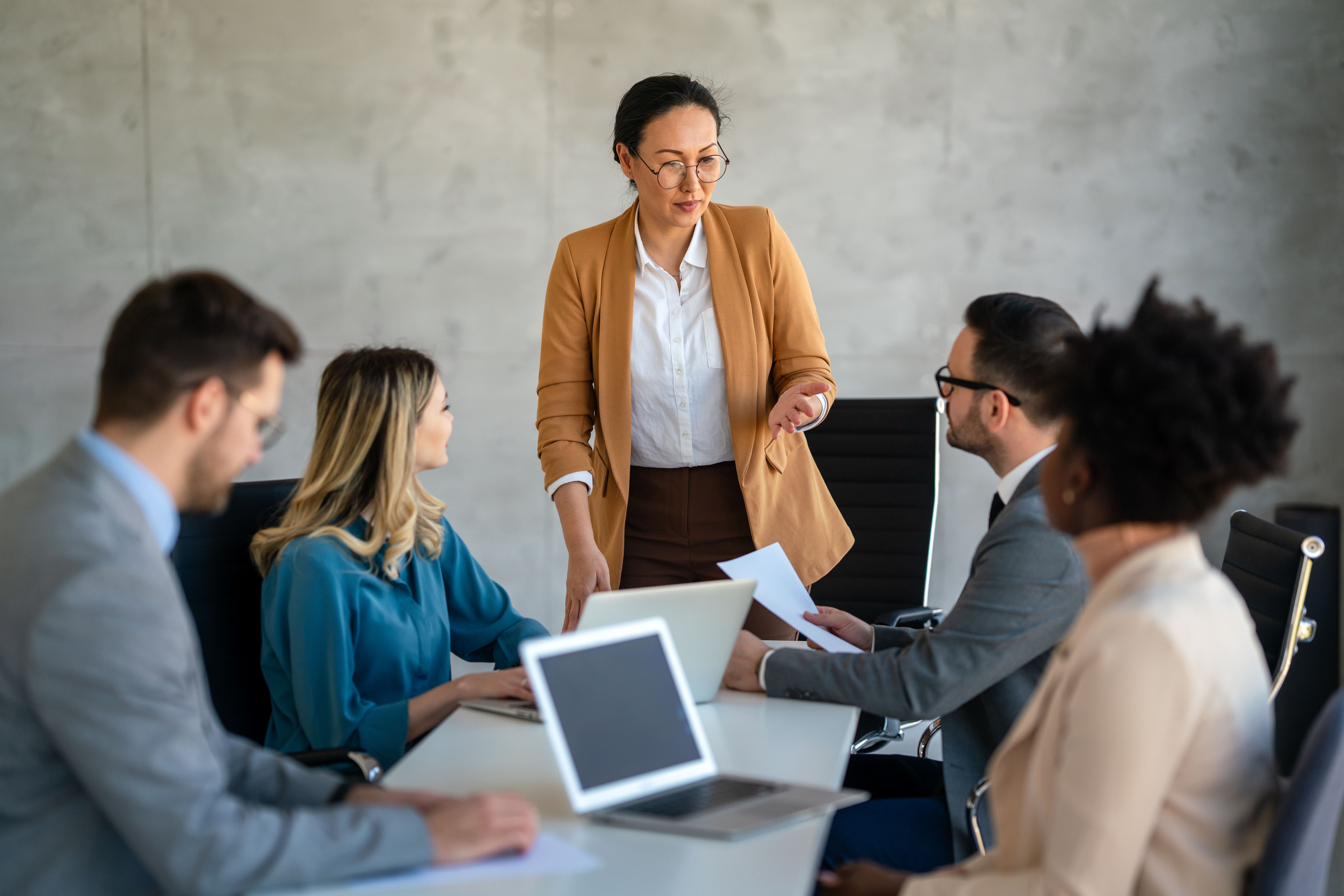 business-meeting-with-team-around-conference-table-2026-01-08-23-40-54-utc (1)